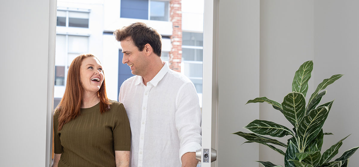 Couple Entering New Home