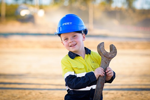 Young boy with Peet helmet