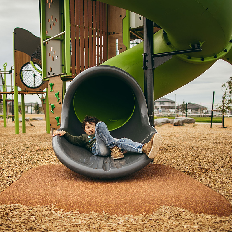 Raffles Park Boy at bottom of slide